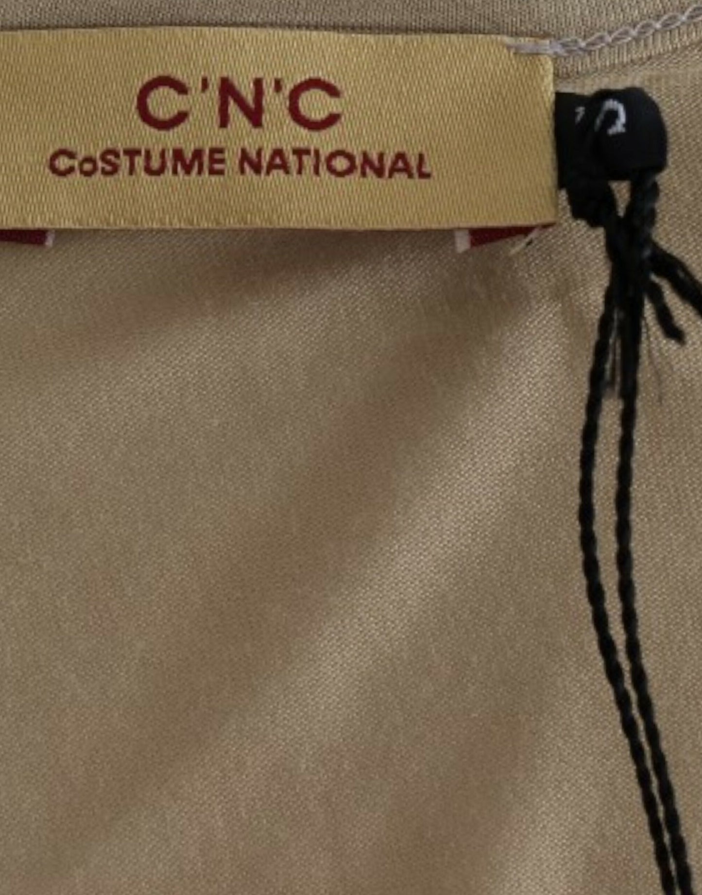 بلوزة تونك أنيقة بفتحة رقبة على شكل حرف V من مجموعة Costume National مع طبعة Motive